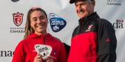 Ian Baggott, Field Hockey Canada President and long-time West Vancouver FHC Member, gives the Best Junior Player Award to Denise Krimerman (CHI)